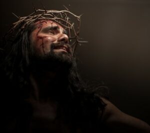 A man with a crown of thorns on his head.