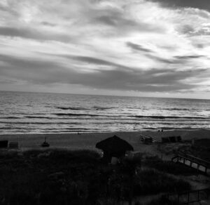 A black and white photo of the ocean.